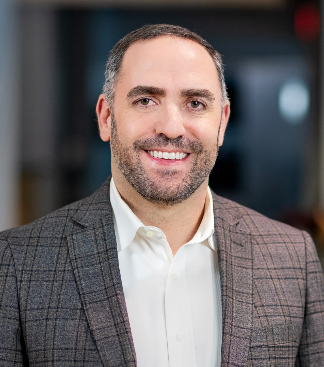 Portrait of Chris Austin - Corporate Vice President - Taylor Corporation